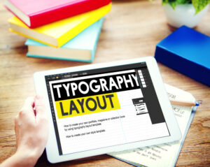 Person using typography app on tablet
