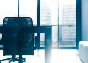 An empty chair at a desk