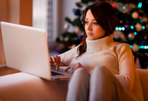 woman on laptop at christmas