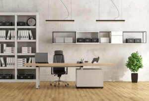 clean organized office with desk, shelves and plant