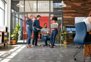 colleagues collaborating in open office space