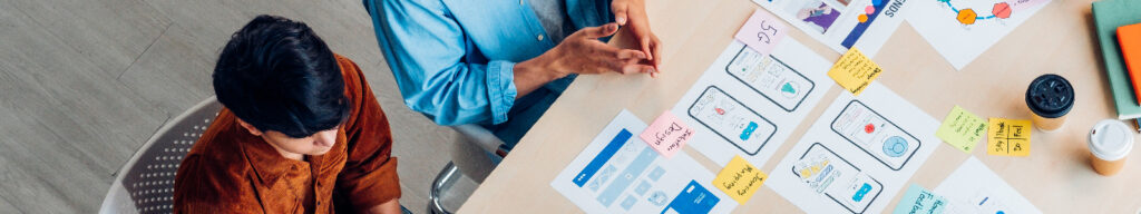 Charts and paper on an office table.