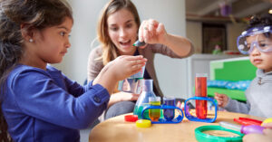 teacher and student in classroom