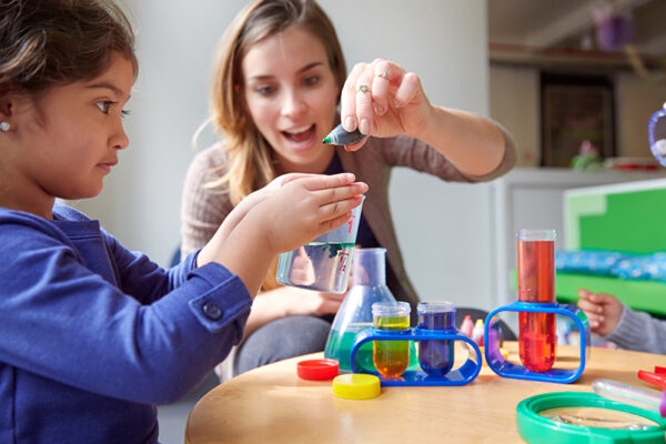 teacher and student in classroom