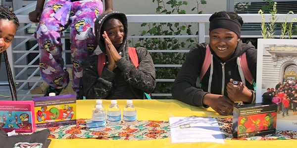 Young people at the table.