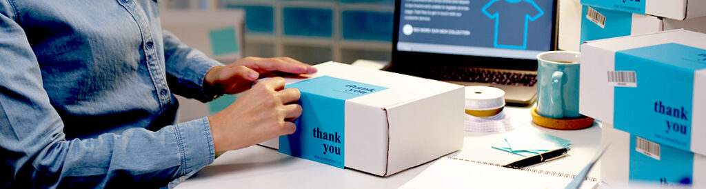 An employee unboxing in their desk.