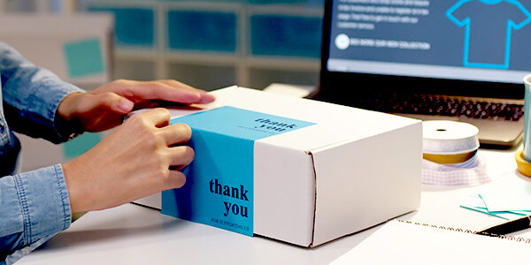 An employee unboxing in their desk.