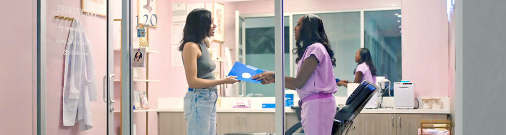 A business owner and her customer talking
