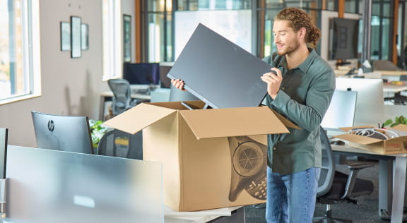 Image of a woman in front of a computer