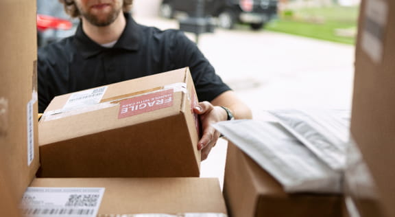 Image of a man loading boxes