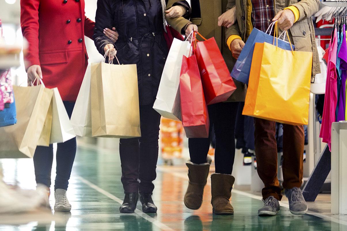 People walking with shopping bags