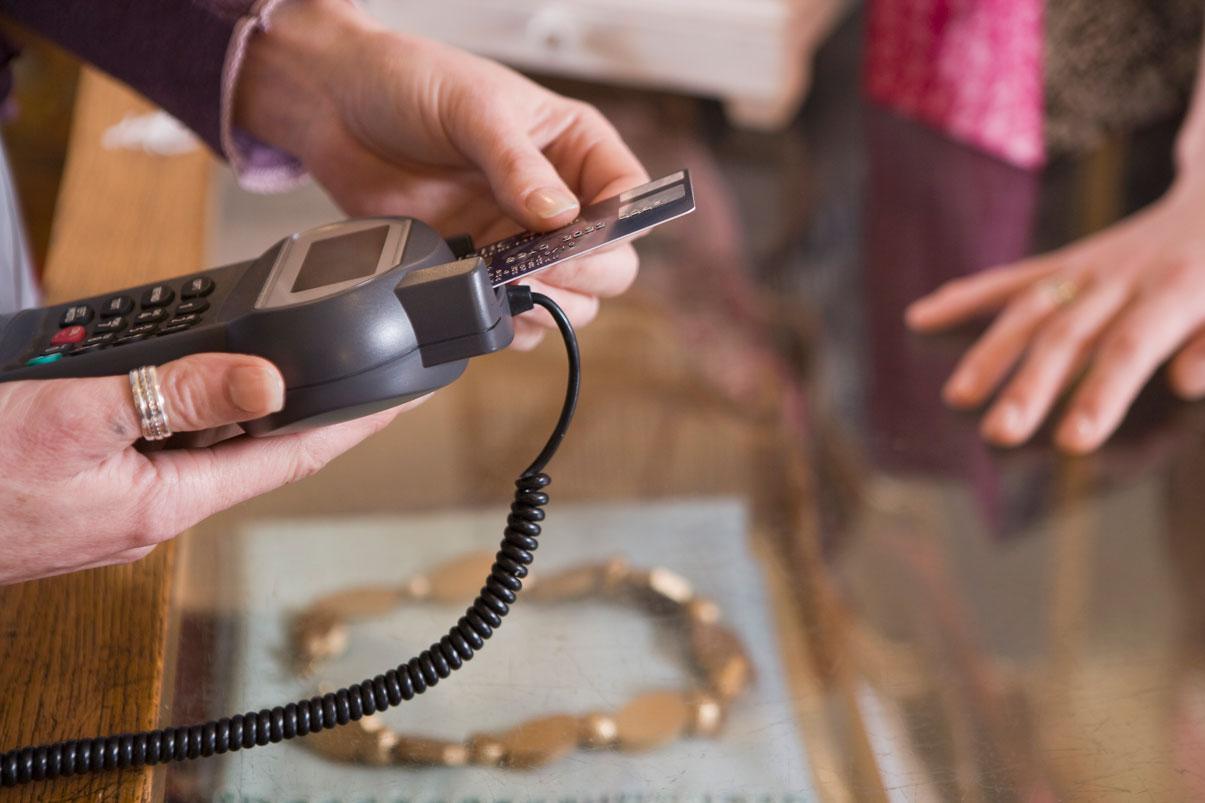 Man using credit card reader