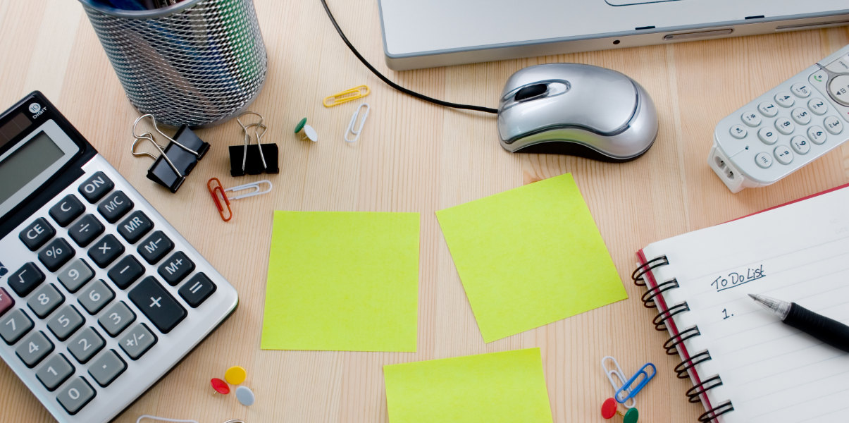 Close-up of cluttered desk.