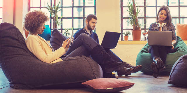 Young people relaxing at the office