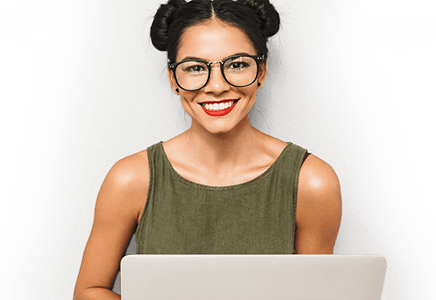 Smiling woman using a laptop