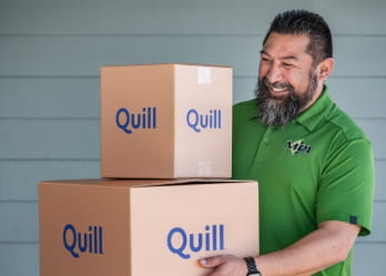 Image of a man carrying boxes