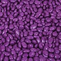 Kimmie Candy brand Purple Sunbursts Chocolate Candy Coated Sunflower Seed in a 5 lbs. bag