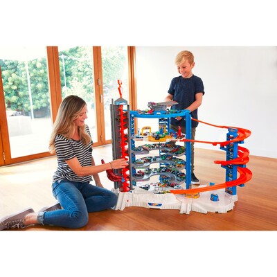 Mattel Hot Wheels Super Ultimate Garage Play Set 4 Cars and 1 Jet Plane, Blue (FML03)